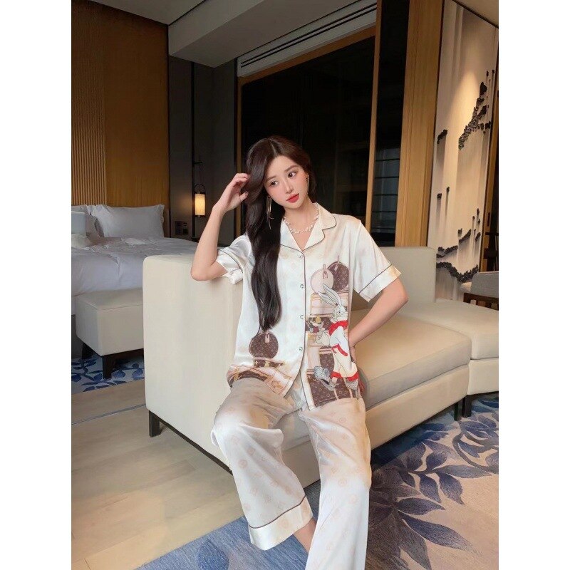 Summer 2023 New Cartoon Rabbit Stylish Bag Printed Ice Silk Pajamas Women's Short Sleeve Trousers Suit Homewear