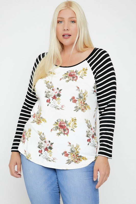 Floral Top Featuring Raglan Style Striped Sleeves And A Round Neck