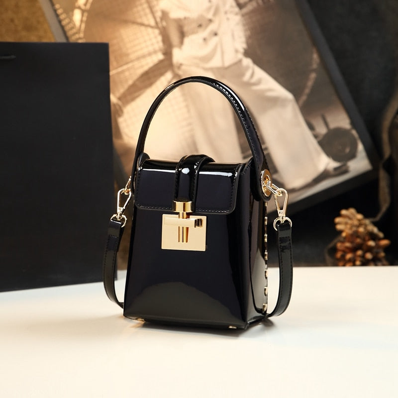 Mobile phone packages female vogue of new fund of 2022 senior feeling small bag leather coat of paint worn handbag handbag joker