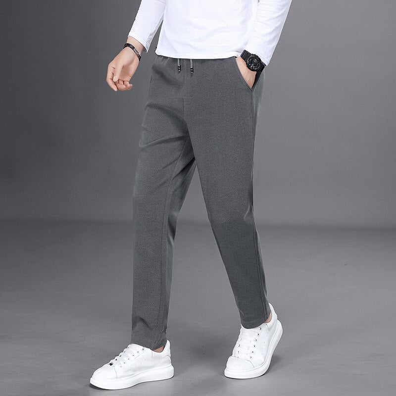 2022 New Spring Aurumn Fashion Joggers Men Pants Casual Loose Harem Pants Mens Sweatpants Elastic Waist Drawstring Long Trousers