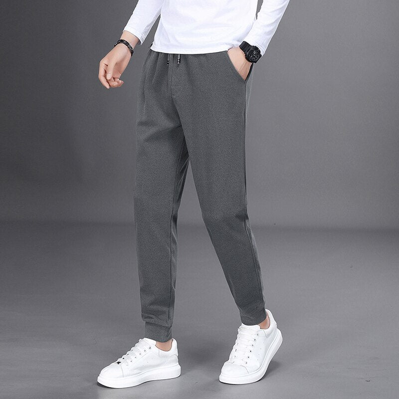 Spring Autumn Black Jogging Pants Men Harajuku Fashion Solid Drawstring Harem Pants Men Long Trousers Elastic Waist Sweatpants