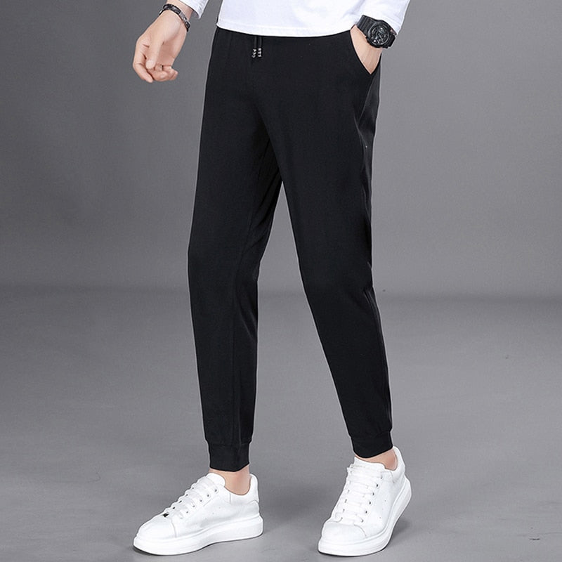 Spring Autumn Black Jogging Pants Men Harajuku Fashion Solid Drawstring Harem Pants Men Long Trousers Elastic Waist Sweatpants