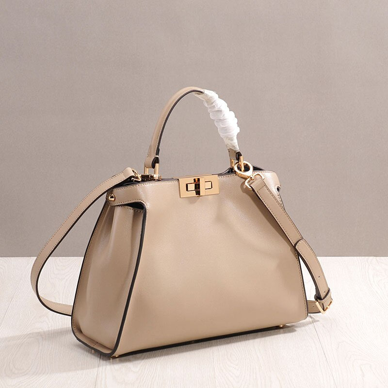 Luxury Design Handbag Cow Leather Women Bag Swivel Buckle Large Kitten Bag Cowhide Ladies Messenger Bag Single Shoulder Bag 2020