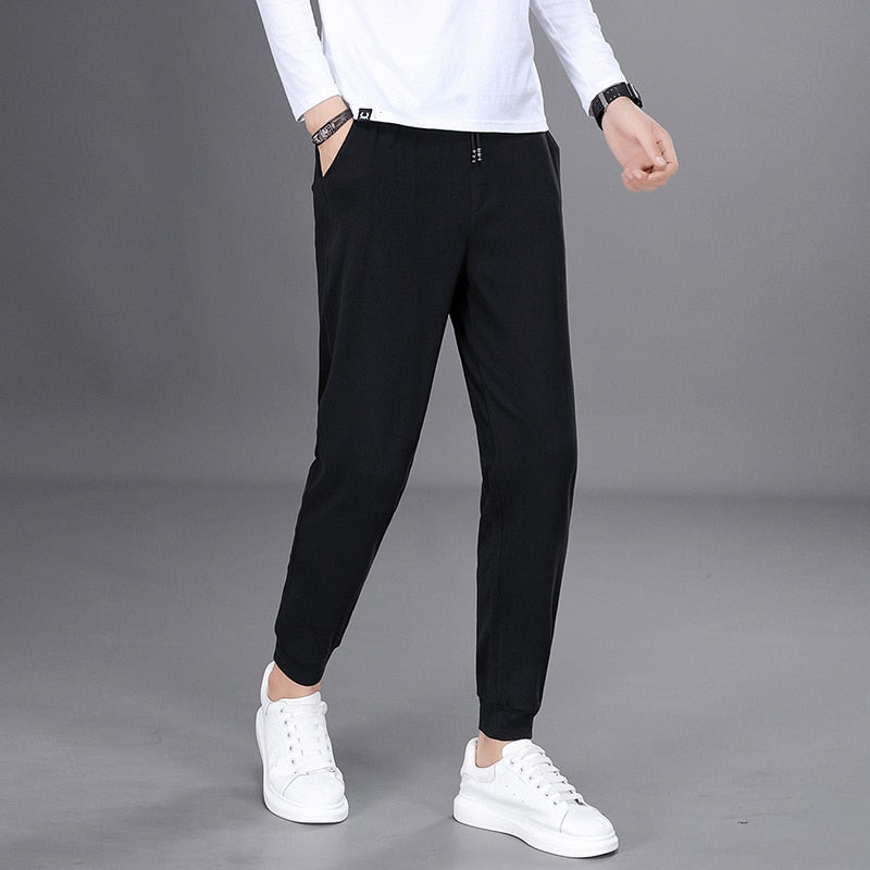 Spring Autumn Black Jogging Pants Men Harajuku Fashion Solid Drawstring Harem Pants Men Long Trousers Elastic Waist Sweatpants