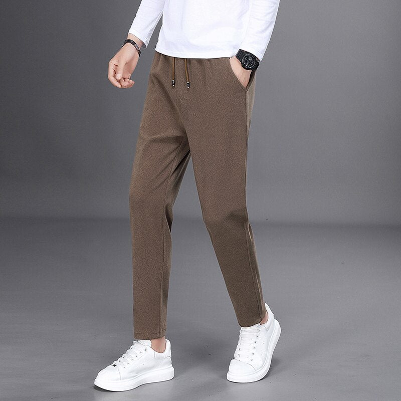 2022 New Spring Aurumn Fashion Joggers Men Pants Casual Loose Harem Pants Mens Sweatpants Elastic Waist Drawstring Long Trousers