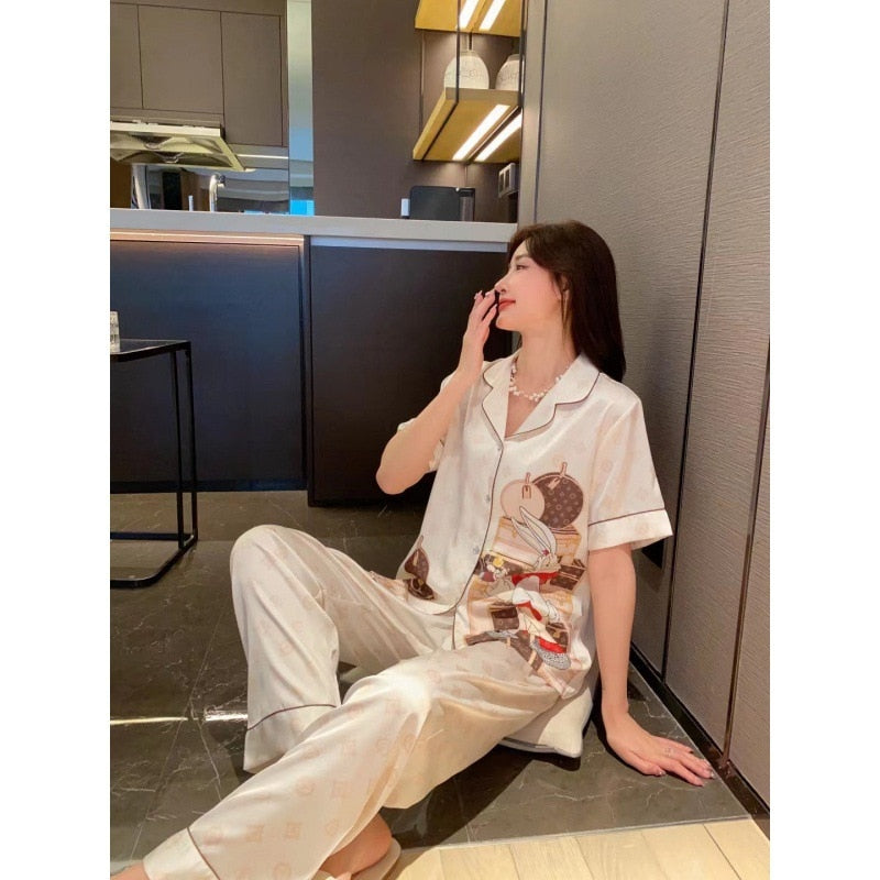 Summer 2023 New Cartoon Rabbit Stylish Bag Printed Ice Silk Pajamas Women's Short Sleeve Trousers Suit Homewear