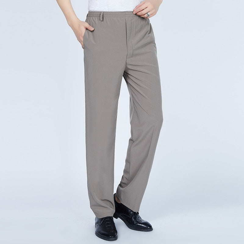 2022 Mens Long Trousers Summer Lightweight Cargo Pants Casual Male Solid Color Elastic Waist Loose Straight Pants Plus Size 4XL