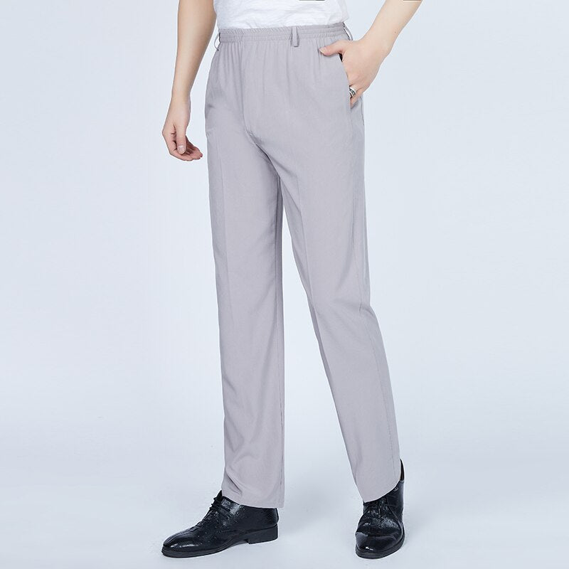 2022 Mens Long Trousers Summer Lightweight Cargo Pants Casual Male Solid Color Elastic Waist Loose Straight Pants Plus Size 4XL